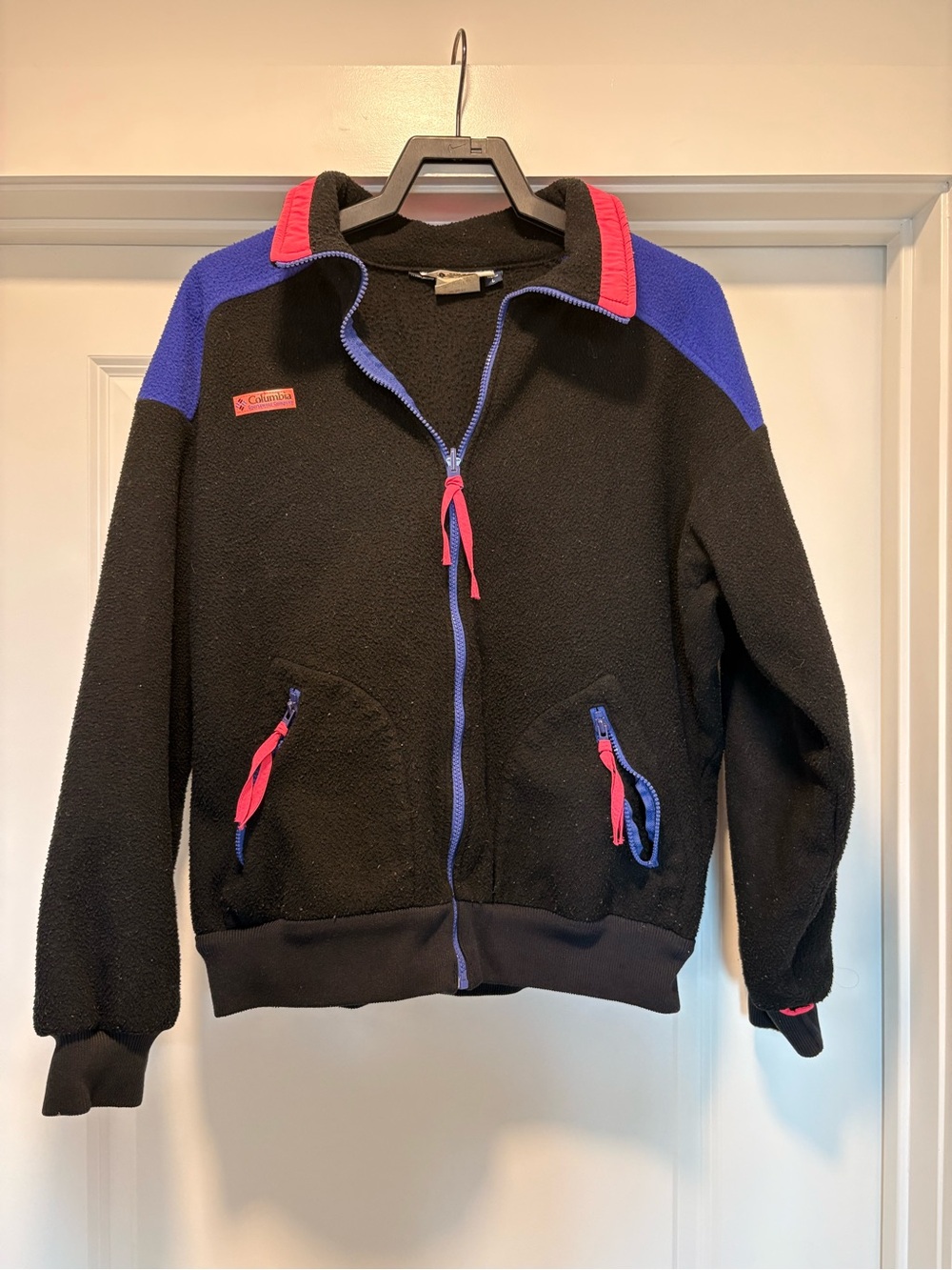 Columbia Black Fleece Jacket with Blue Shoulders and Pink Trim
